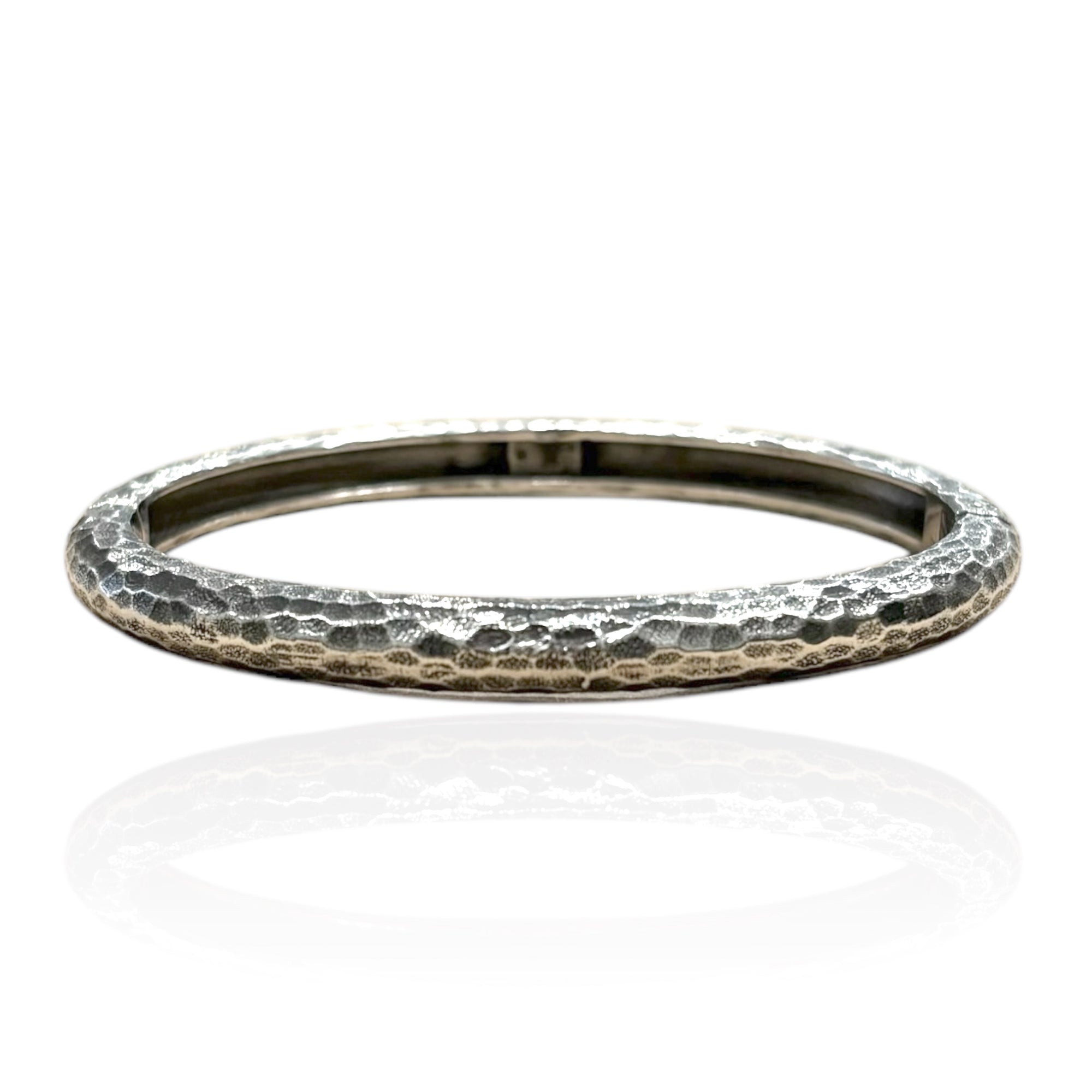 VINTAGE SILVER RIVA HAMMERED BANGLE