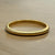 GOLD RIVA BANGLE