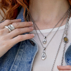 VINTAGE SILVER IMPRESSION TEAR DROP NECKLACE